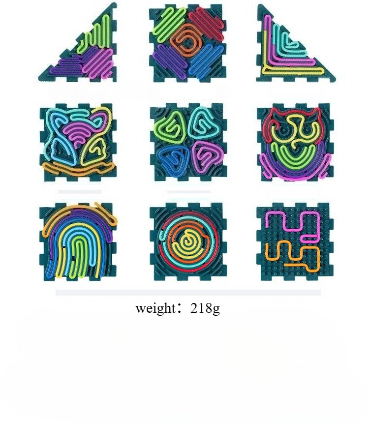 Colorful foam puzzle pieces with geometric designs on a white background