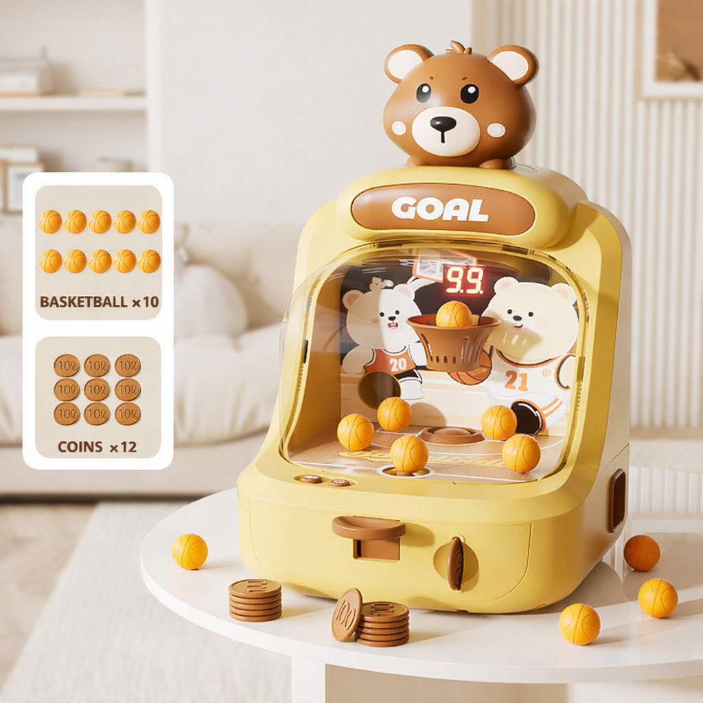 Yellow toy basketball machine with bear design on a white surface