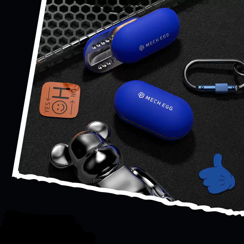 Blue MECH EGG earbuds with charging case on a black surface, featuring brand name and logo.