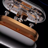 Close-up of a guitar pickup with metallic finish on a black background