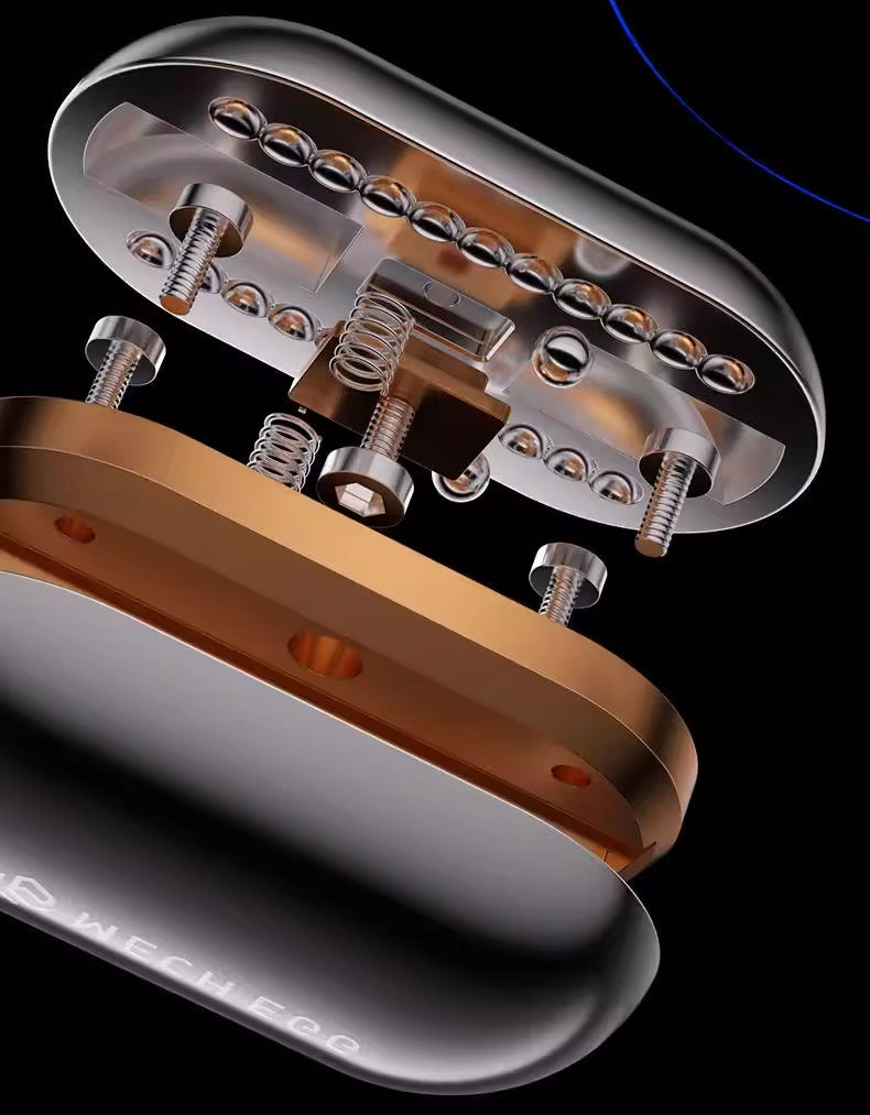 Close-up of a guitar pickup with metallic finish on a black background