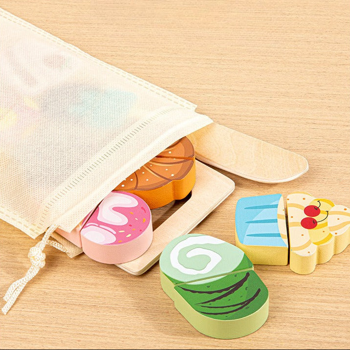 Colorful wooden toy set on a wooden board with a storage bag.