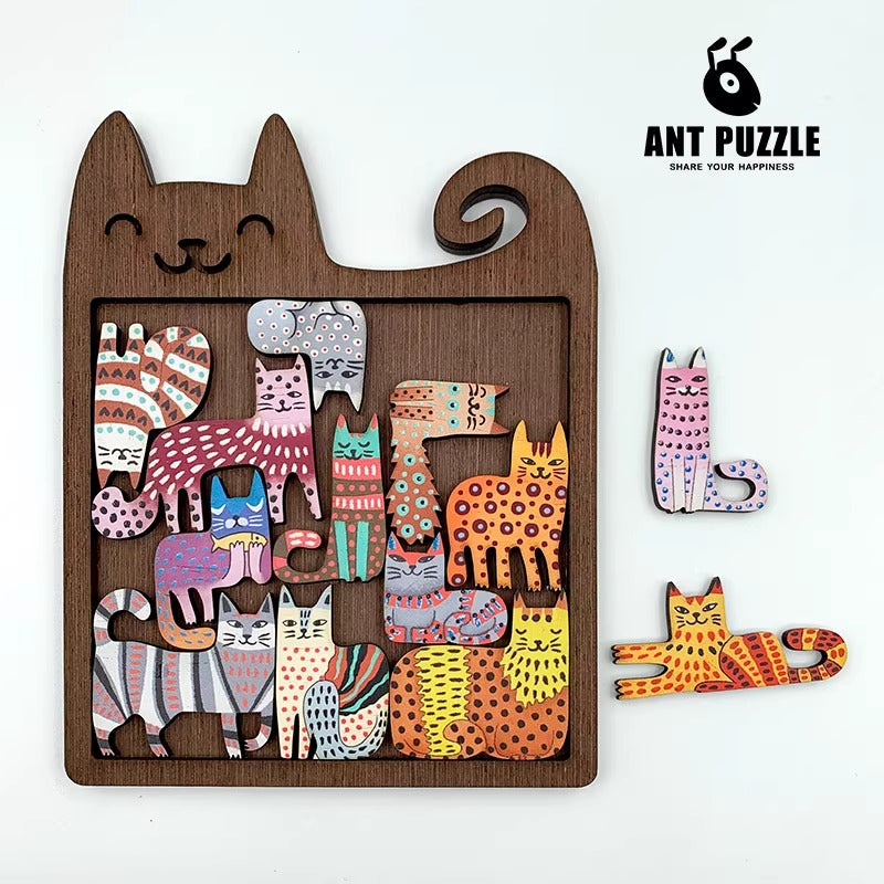 Wooden puzzle with colorful cat illustrations and Ant Puzzle branding.