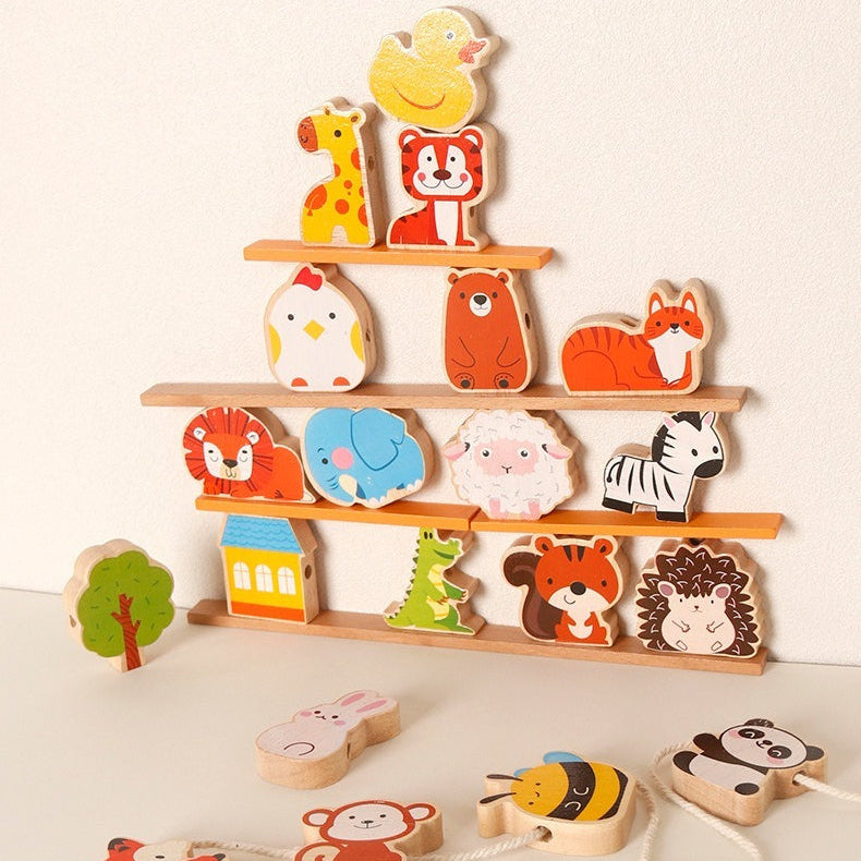 Set of wooden animal toys on shelves with additional toys on the floor.