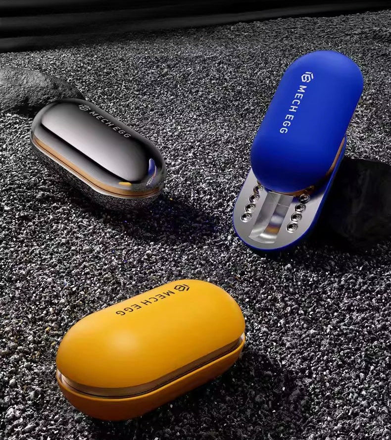 Three small devices in blue, yellow, and silver on a textured surface