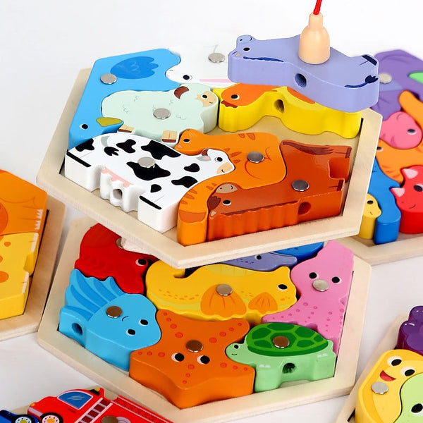 Colorful wooden puzzle with animal shapes on a white background