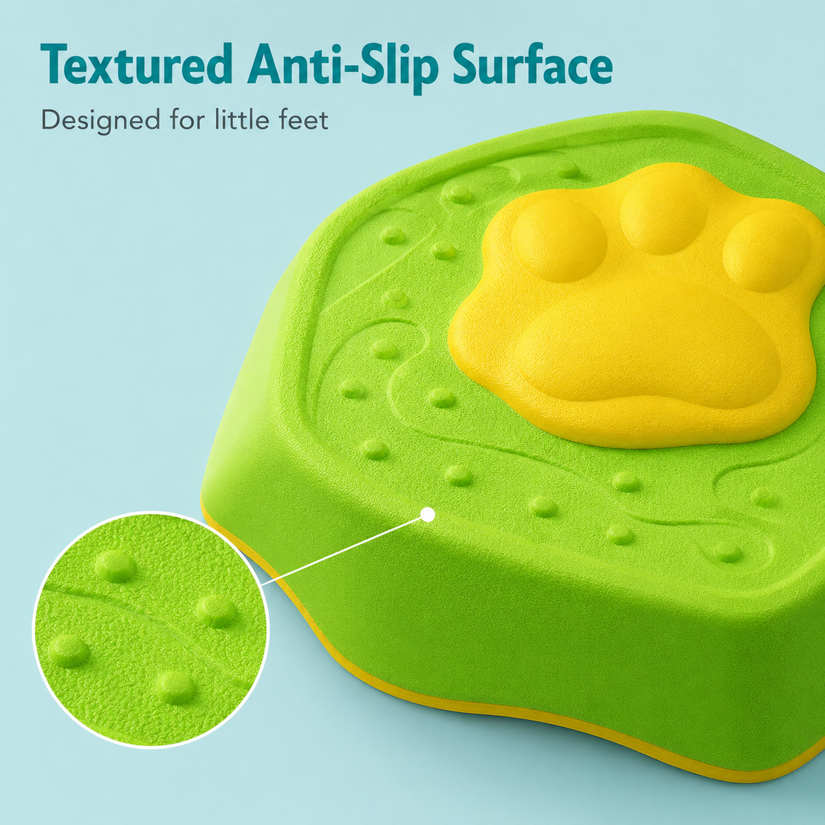 Green step stool with yellow paw design and textured surface on a light blue background