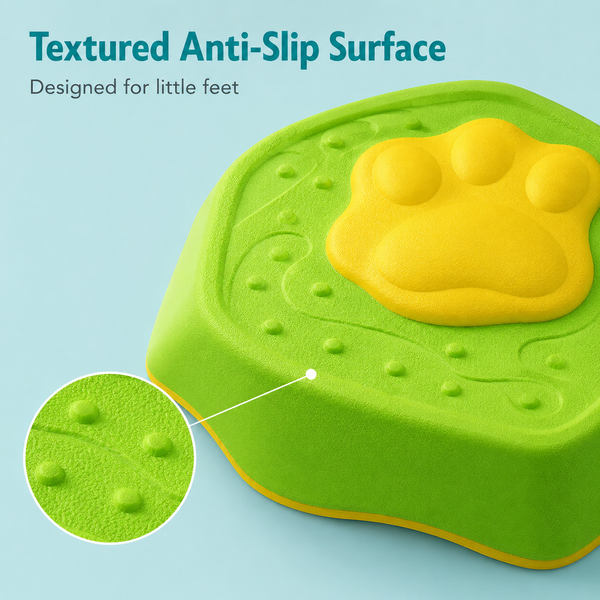 Green step stool with yellow paw design and textured surface on a light blue background