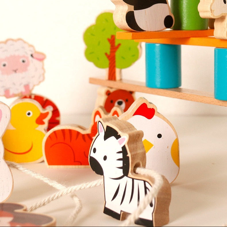 Children's wooden toys with animal designs on a shelf