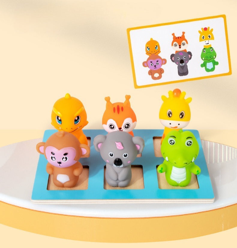 Set of colorful animal figurines on a blue base with a yellow border in the background.