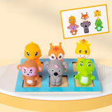 Set of colorful animal figurines on a blue base with a yellow border in the background.