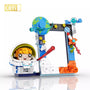 Toy figure of an astronaut with space-themed accessories on a white background, featuring the brand 'CAYI'.