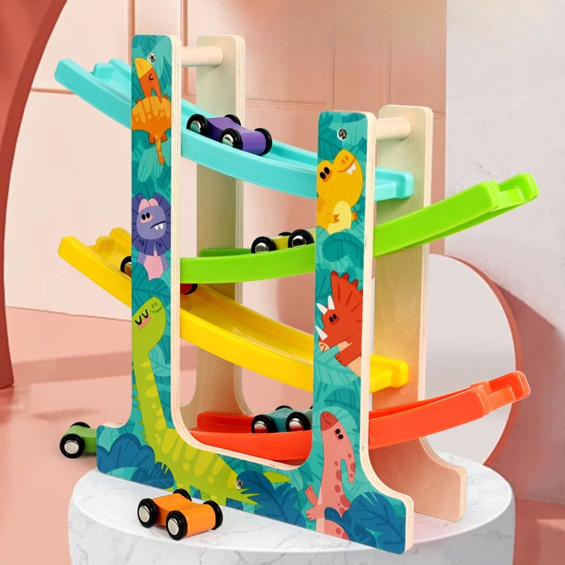 Colorful wooden toy track with cartoon animal designs and small cars on a white platform.