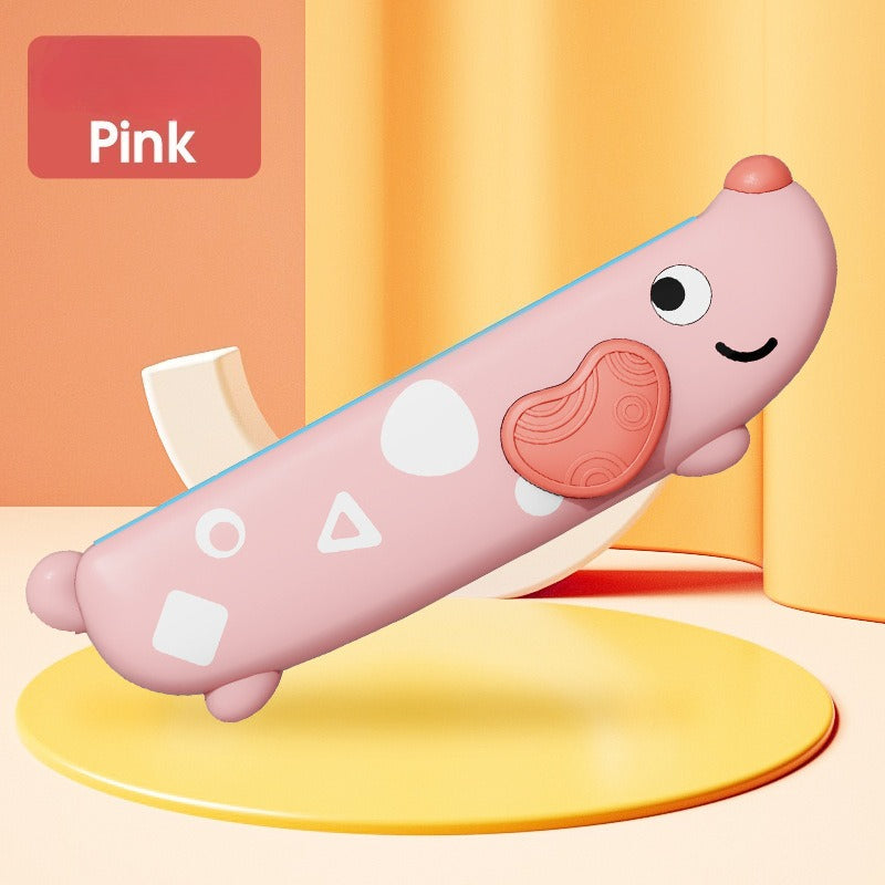 Pink cartoon-style hot dog with a smiling face on a yellow platform against an orange background