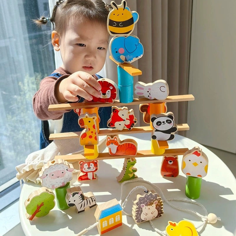Child playing with a wooden toy featuring animal figures.