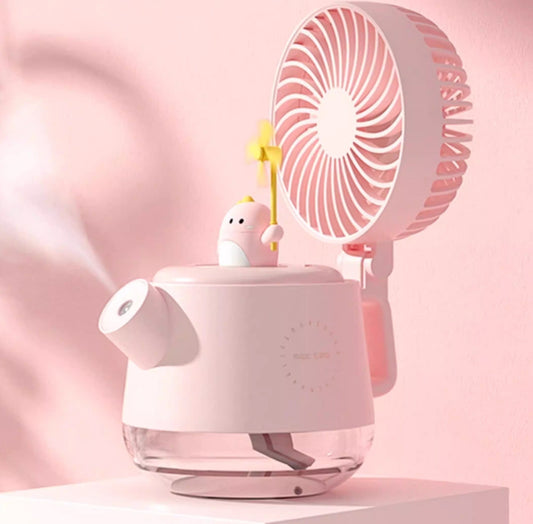 Pink humidifier with a small figurine on a pink background
