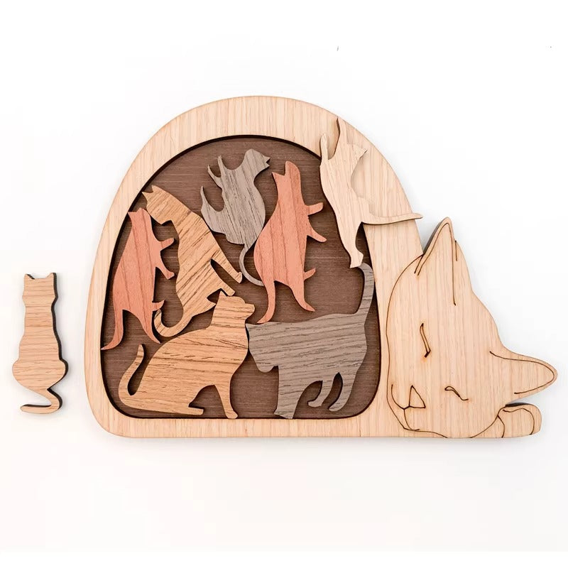 Wooden puzzle with cat shapes on a white background