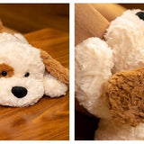 Plush dog toy with brown ears and black nose on a wooden surface