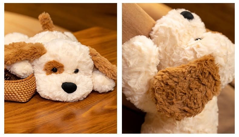 Plush dog toy with brown ears and black nose on a wooden surface