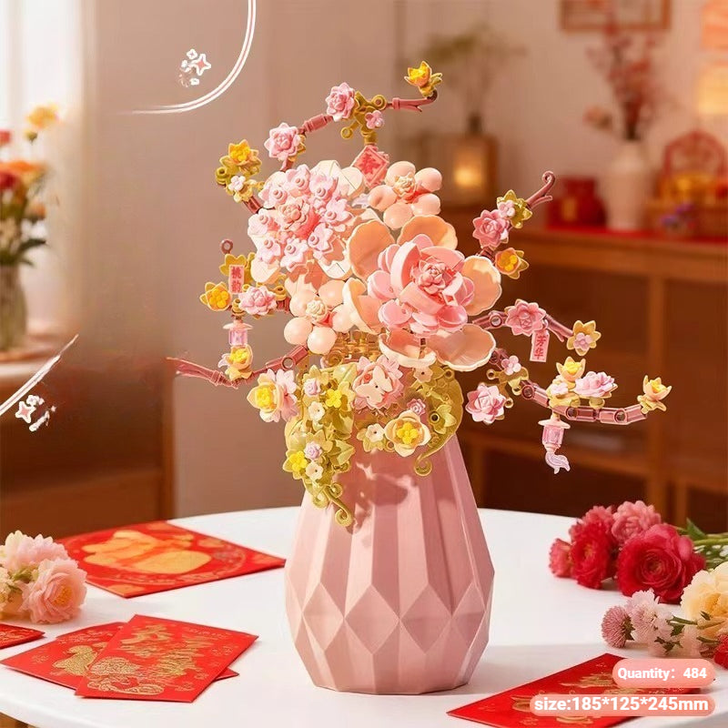 Decorative pink vase with flowers on a table with red cards in a blurred indoor setting