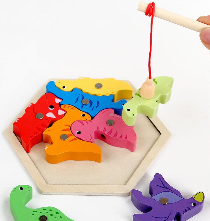 Wooden fishing game with colorful dinosaur-shaped hooks on a white background