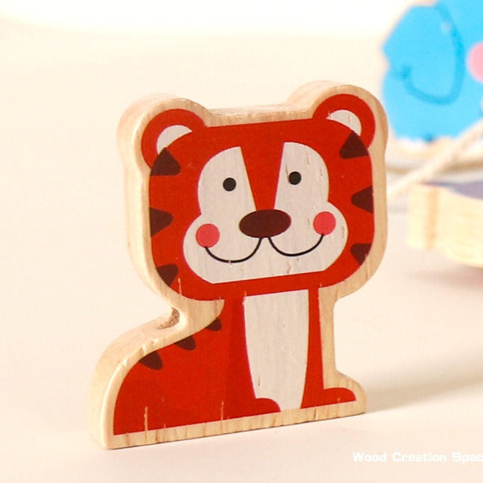 Wooden toy with a tiger design on a light background