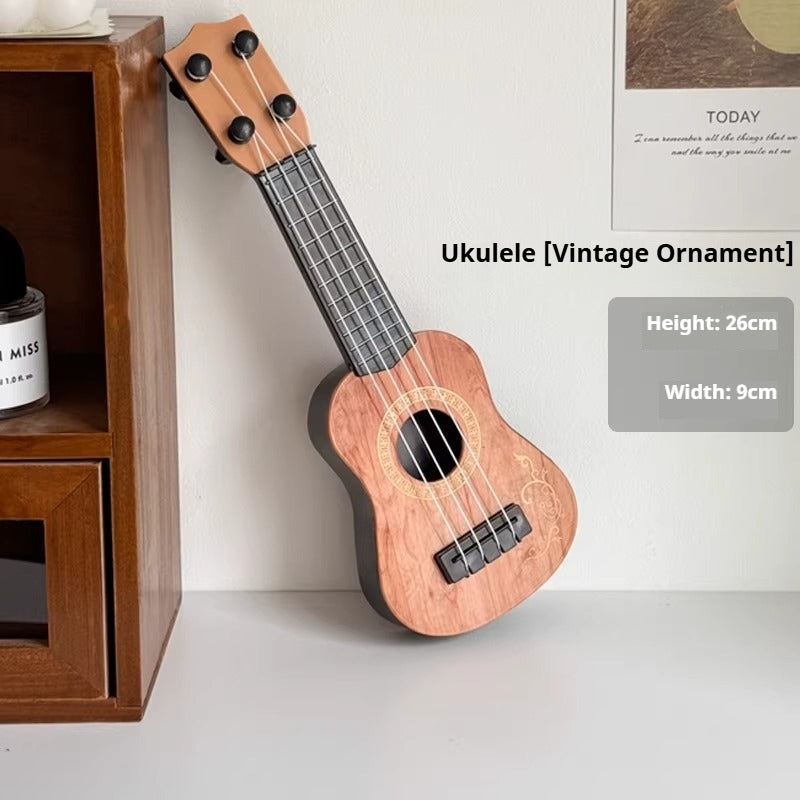 Wooden ukulele ornament on a white surface with a wooden shelf in the background