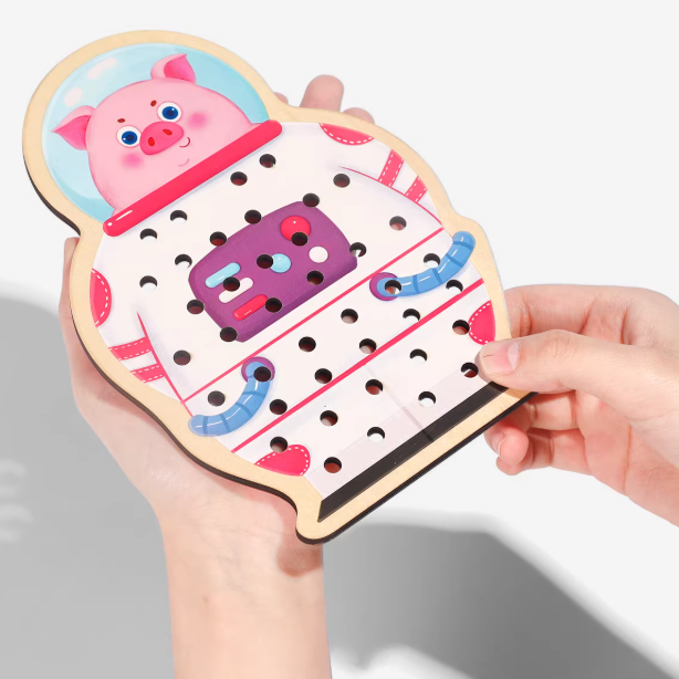 Hand holding a children's puzzle with cartoon characters on a white background