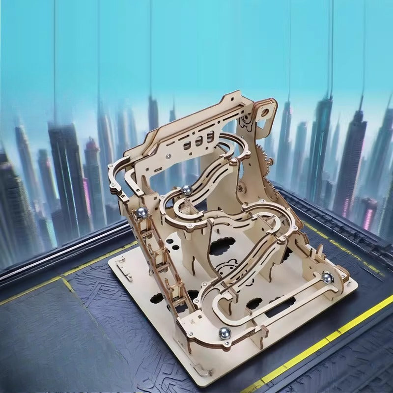 Wooden mechanical model kit on a stand with a cityscape background