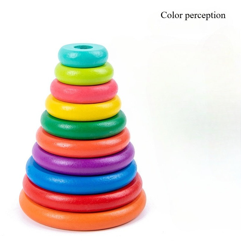 Colorful stack of wooden rings on a white background