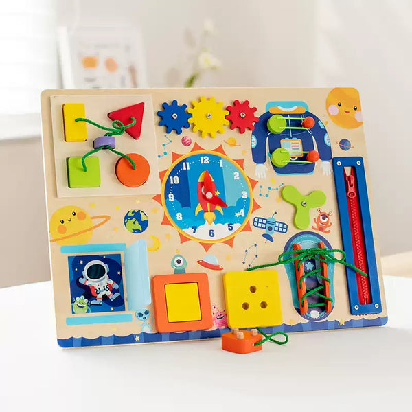 Wooden busy board shown with its product box for a clear package contents display.
