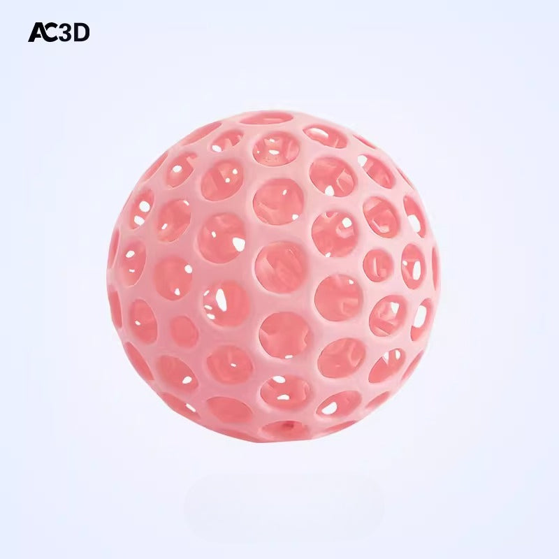 Light pink lattice stress relief ball with 3D-printed open structure