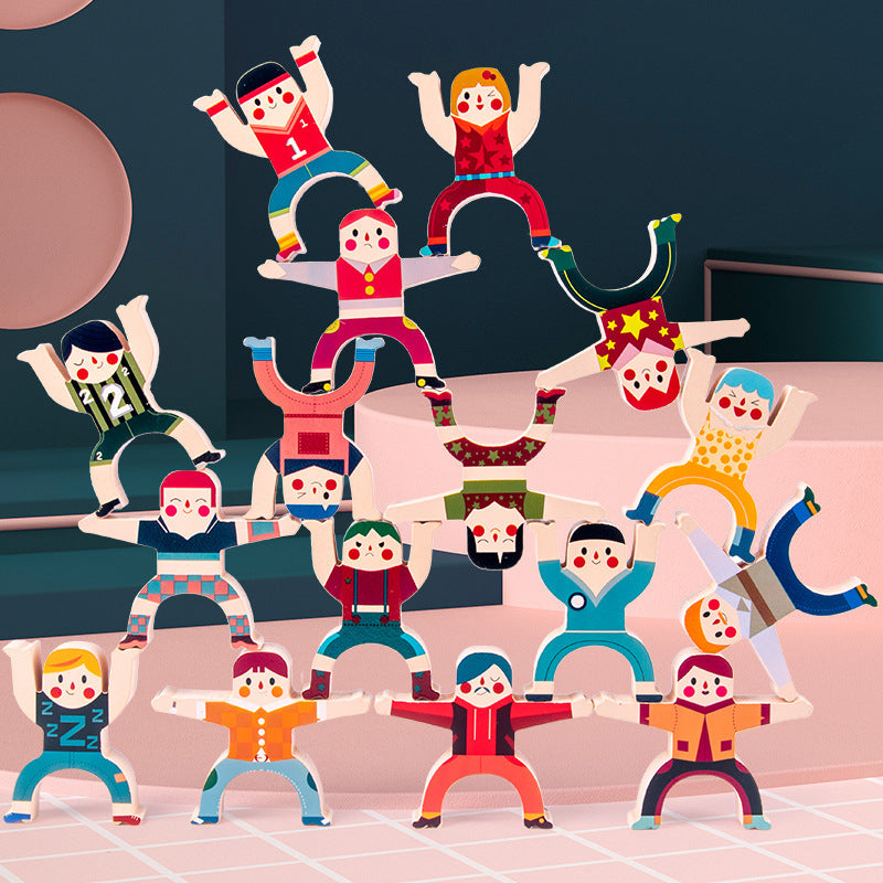 Colorful paper dolls arranged in a pyramid formation on a dark background