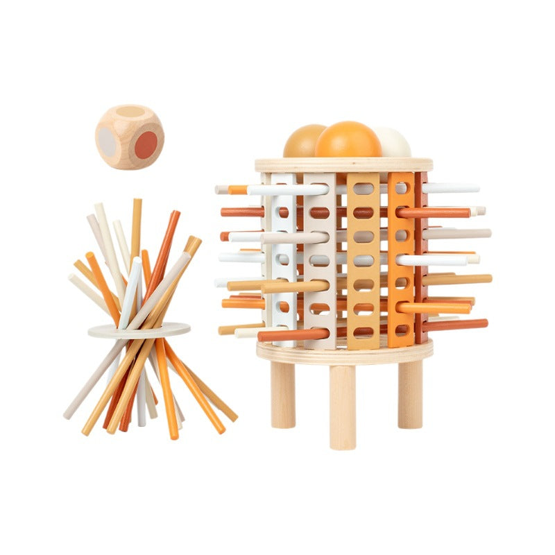 Wooden toy with cylindrical pegs and a dice on a white background