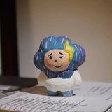 Hand-Carved Wooden Storm Boy Figurine FantastiKurios