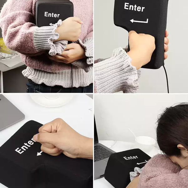 Black 'Enter' key pillow held by a person and used as a neck pillow.