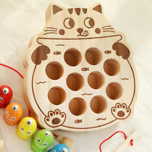 Wooden cat-shaped toy with colorful beads on a light background