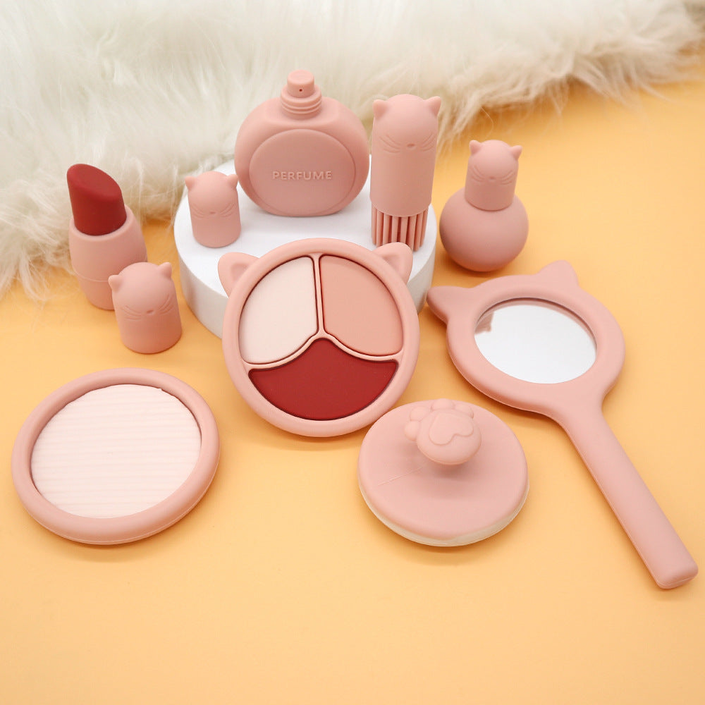Child playing with mess-free silicone pretend makeup toy set