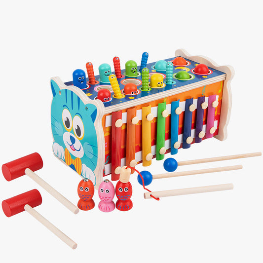 Colorful wooden toy with mallets and hanging characters on a white background