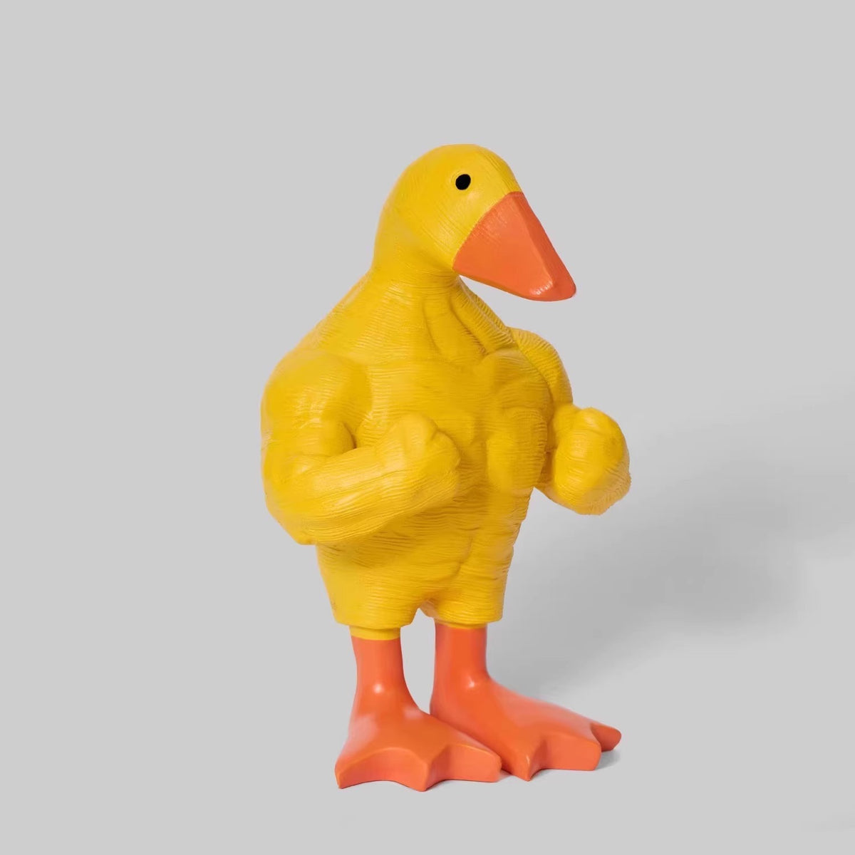 Three-step gift scene showing a funny duck figurine being unboxed, displayed, and gifted.