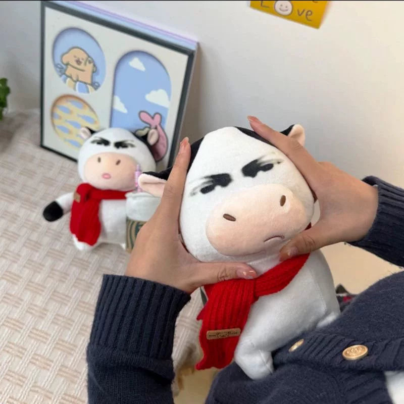 Skeptical Cow Plush Toy with Red Scarf