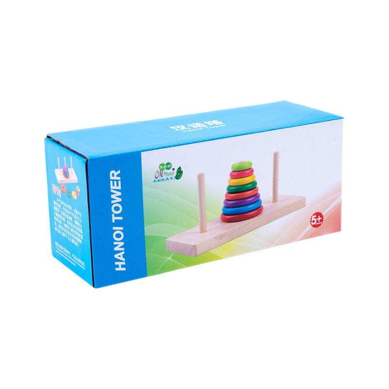 Box of a Hanoi Tower educational toy with colorful rings on a white background