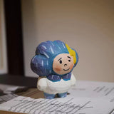 Hand-Carved Wooden Storm Boy Figurine FantastiKurios