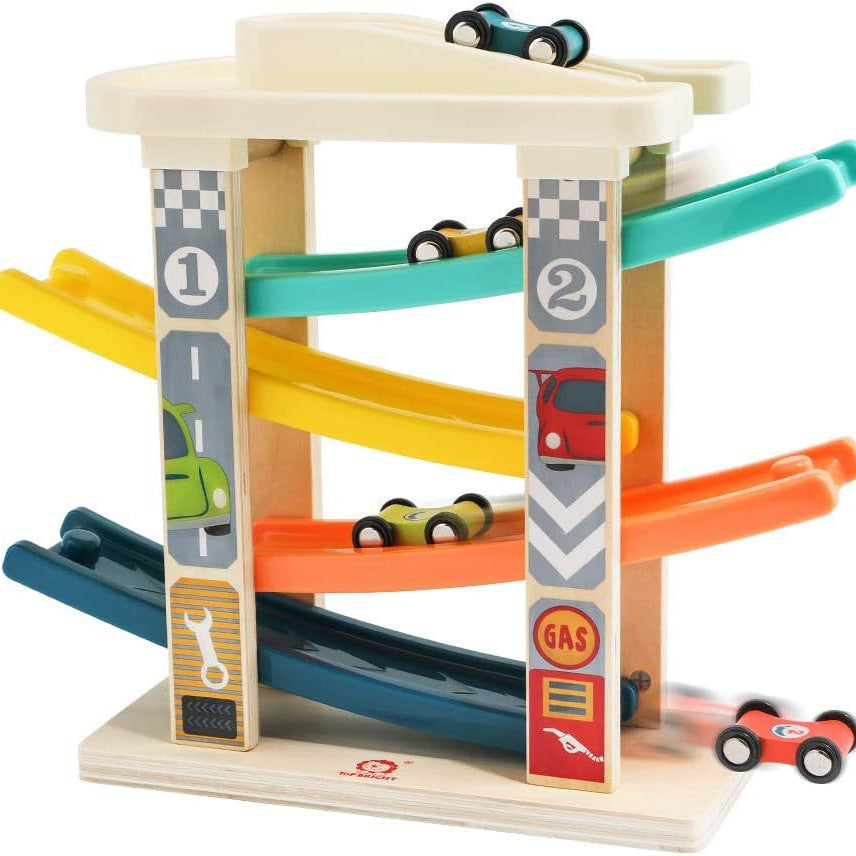 Colorful toy race track with cars on a white background