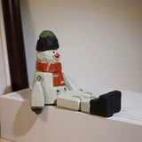 Hand-Painted Wooden Sitting Snowman Figurine with Jointed Legs FantastiKurios