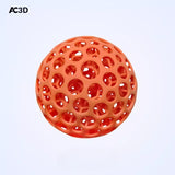 Orange 3D-printed lattice stress relief ball