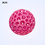 Pink lattice stress relief ball with 3D-printed open structure