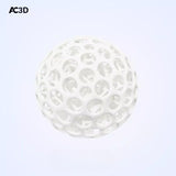 White lattice stress relief ball with 3D-printed open structure