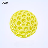 Yellow lattice stress relief ball with 3D-printed open structure