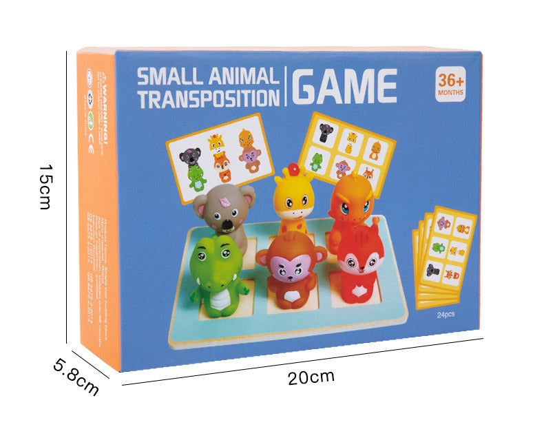 Box of a small animal transposition game with toy animals and cards on a blue background